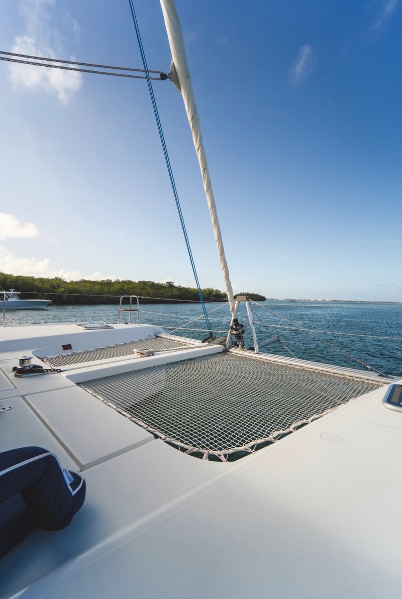From LunaCat's foredeck — underway through mangroves